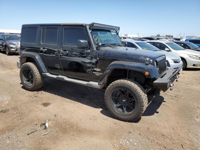 1C4BJWEG3EL106480 - 2014 JEEP WRANGLER U SAHARA BLACK photo 4