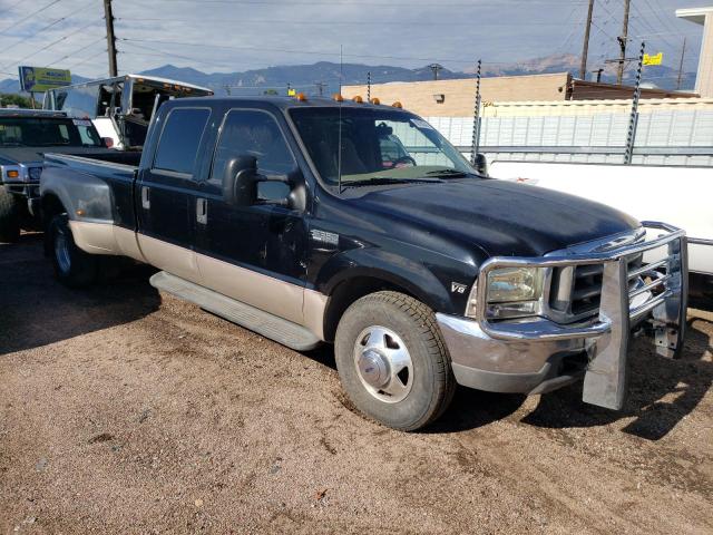 1FTWW32F3XEA70844 - 1999 FORD F350 SUPER DUTY BLACK photo 4