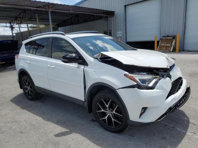 JTMNFREV1JJ188875 - 2018 TOYOTA RAV4 SE WHITE photo 4