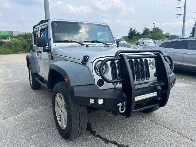 1J4HA3H16BL500982 - 2011 JEEP WRANGLER U SPORT فضي صورة 1