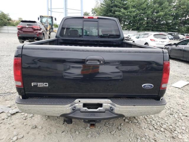 1FTRX18W82NA31729 - 2002 FORD F150 Schwarz Foto 6
