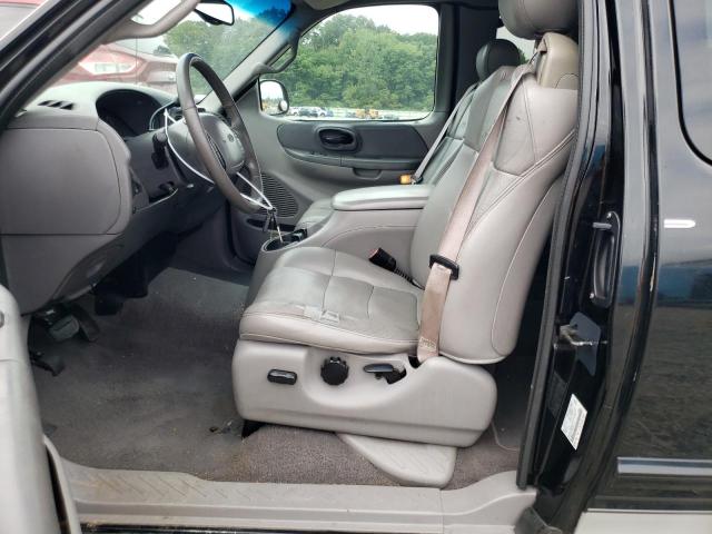 1FTRX18W82NA31729 - 2002 FORD F150 Schwarz Foto 7