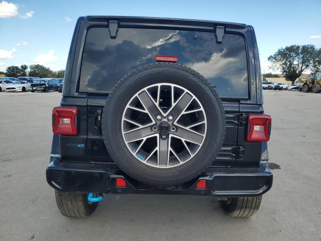1C4JJXP67NW102887 - 2022 JEEP WRANGLER U SAHARA 4XE BLACK photo 6