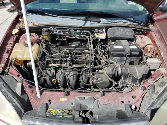 1FAHP34N26W132680 - 2006 FORD FOCUS ZX4 BURGUNDY photo 11