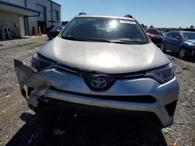 2T3ZFREV5HW344364 - 2017 TOYOTA RAV4 LE SILVER photo 5