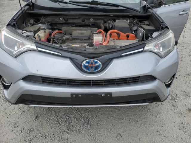 JTMRJREV0JD249504 - 2018 TOYOTA RAV4 HV LE Silber Foto 12