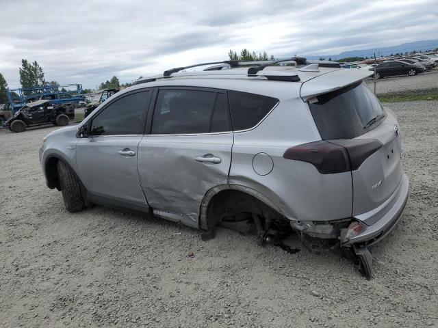 JTMRJREV0JD249504 - 2018 TOYOTA RAV4 HV LE Silber Foto 2