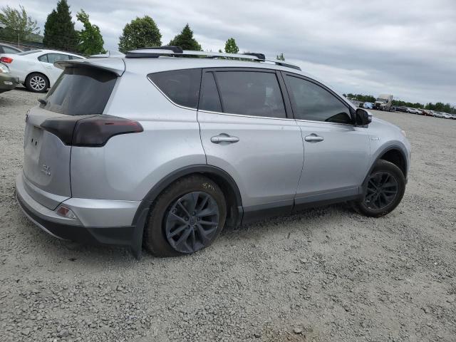 JTMRJREV0JD249504 - 2018 TOYOTA RAV4 HV LE Silber Foto 3