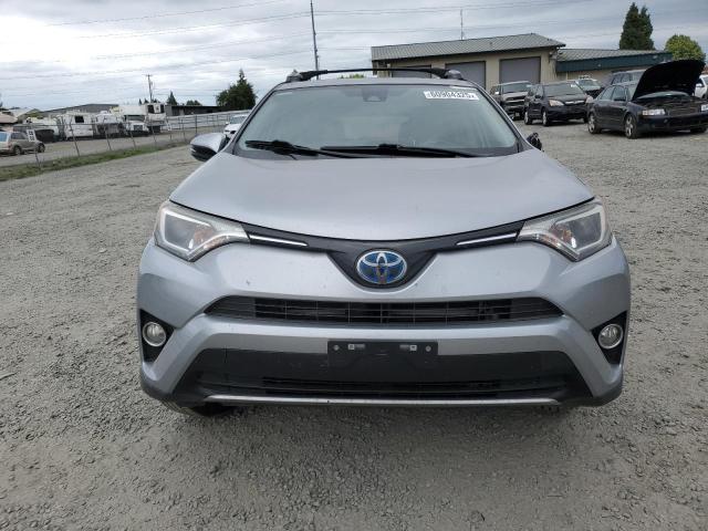 JTMRJREV0JD249504 - 2018 TOYOTA RAV4 HV LE Silber Foto 5