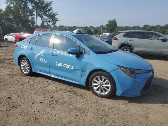5YFVPMAE7MP194850 - 2021 TOYOTA COROLLA LE ლურჯი ფოტო 4