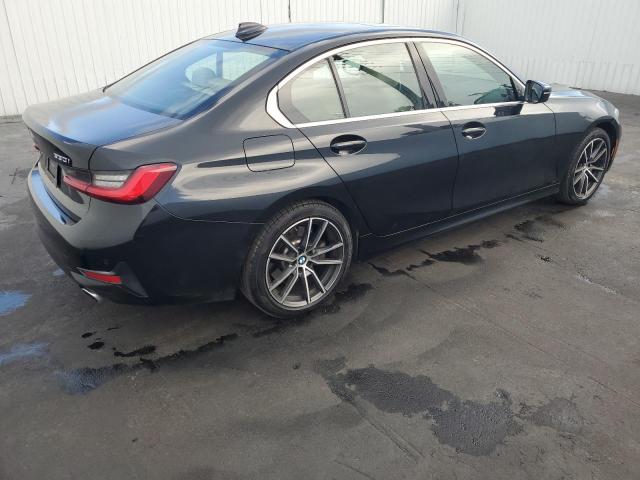 3MW5R7J06M8C12011 - 2021 BMW 330XI BLACK photo 3