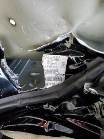 5LMPU28A0XLJ17820 - 1999 LINCOLN NAVIGATOR შავი ფოტო 14