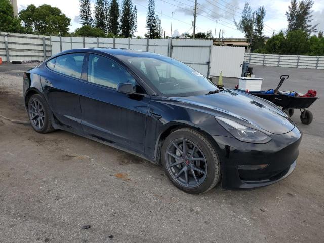 5YJ3E1EA9PF495347 - 2023 TESLA MODEL 3 BLACK photo 4