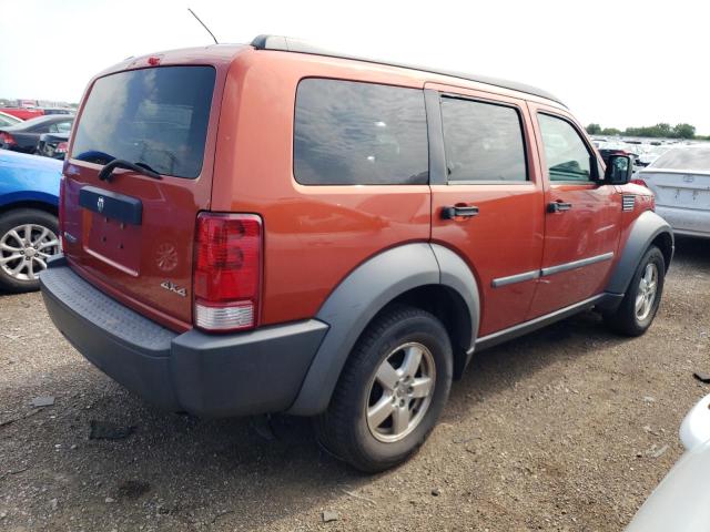 1D8GU28K37W728652 - 2007 DODGE NITRO SXT ORANGE photo 3