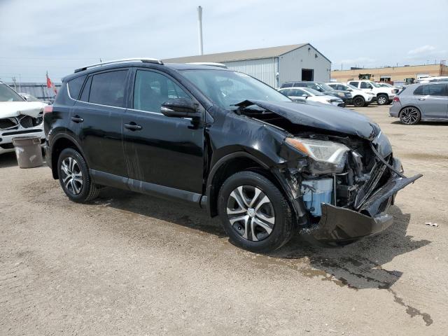 2T3ZFREV7GW238562 - 2016 TOYOTA RAV4 LE BLACK photo 4