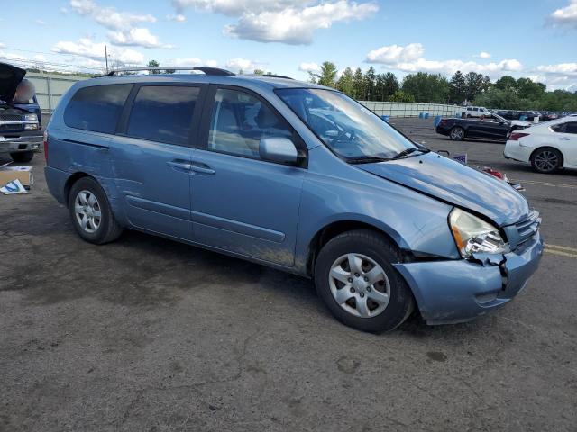 KNDMG4C39A6339171 - 2010 KIA SEDONA LX BLUE photo 4