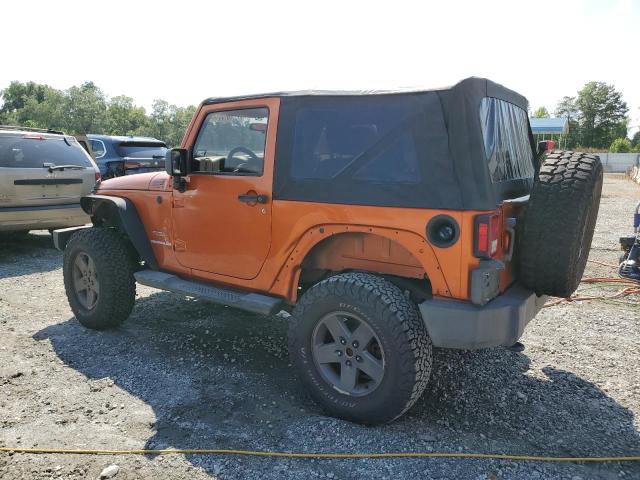 1J4GA2D13BL519310 - 2011 JEEP WRANGLER SPORT ORANGE photo 2