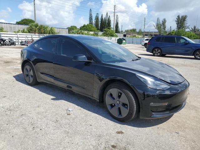 5YJ3E1EA7NF242606 - 2022 TESLA MODEL 3 BLACK photo 4