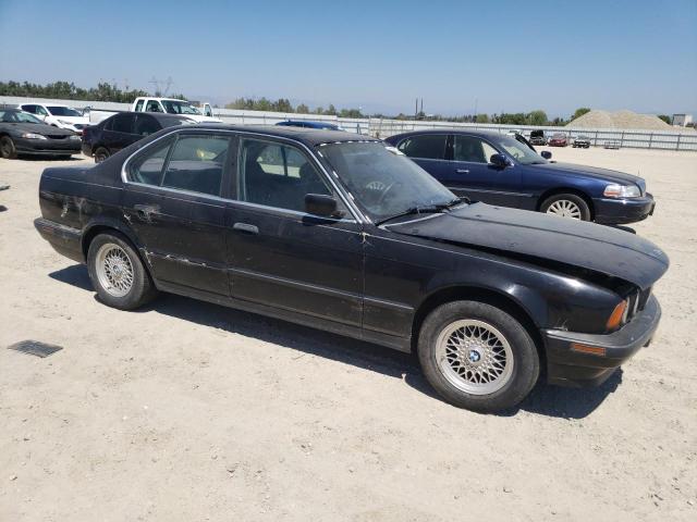WBAHD2319PBF74943 - 1993 BMW 535 I AUTOMATIC შავი ფოტო 4