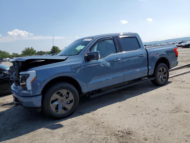 1FT6W1EV9PWG16337 - 2023 FORD F150 LIGHTNING PRO BLUE photo 1