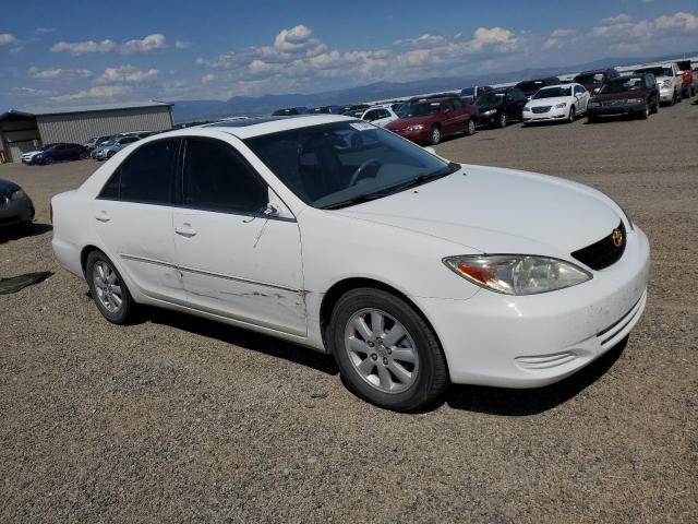 4T1BF30K92U009913 - 2002 TOYOTA CAMRY LE WHITE photo 4