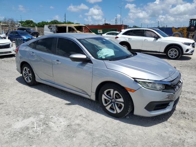 19XFC2F59JE021583 - 2018 HONDA CIVIC LX SILVER photo 4