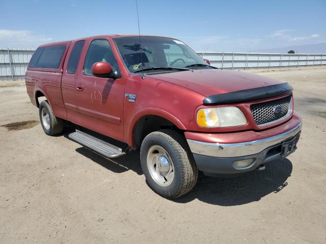 1FTRX18L9YKA97626 - 2000 FORD F150 MAROON photo 4