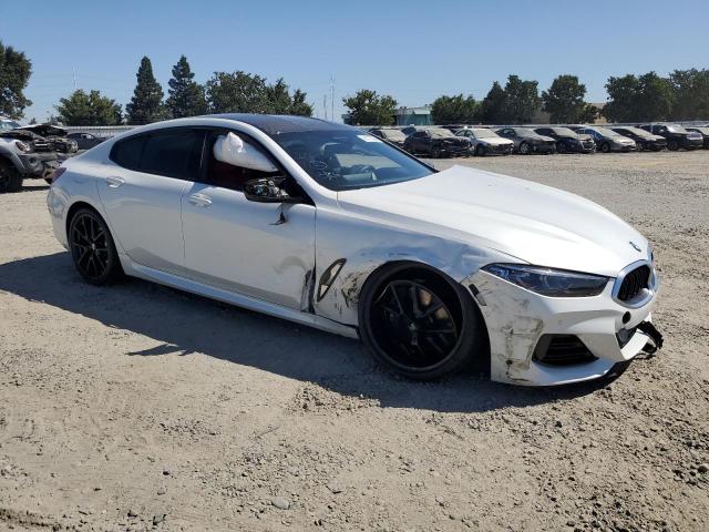 WBAGV8C0XPCK39846 - 2023 BMW M850XI WHITE photo 4