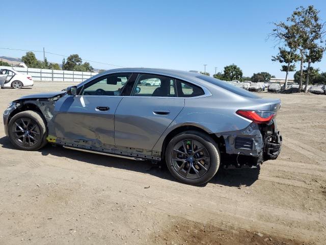 WBY43AW09RFT39564 - 2024 BMW I4 EDRIVE 35 GRAY photo 2