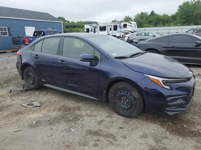 JTDBDMHE7PJ003549 - 2023 TOYOTA COROLLA LE Blau Foto 4