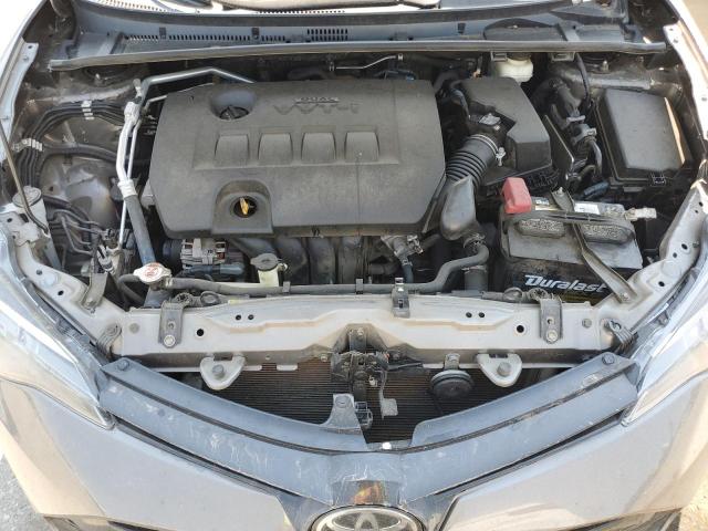 5YFBURHEXJP743810 - 2018 TOYOTA COROLLA L თაფლისფერი ფოტო 11