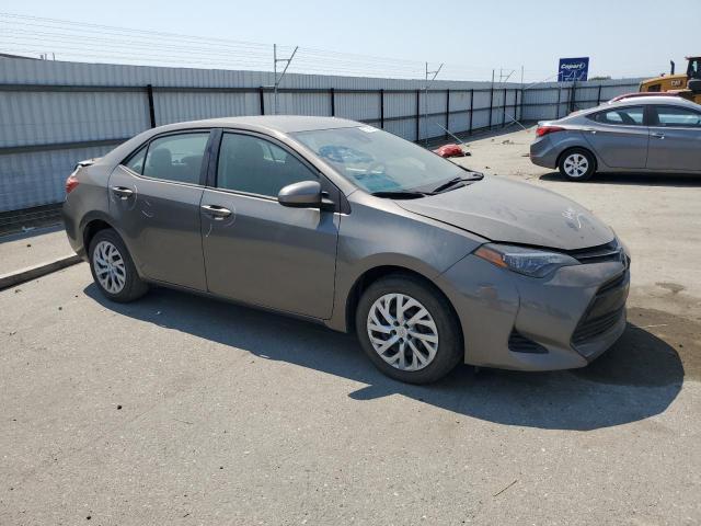5YFBURHEXJP743810 - 2018 TOYOTA COROLLA L თაფლისფერი ფოტო 4