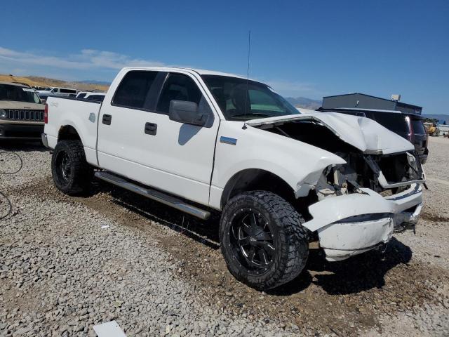 1FTPW14565KE19488 - 2005 FORD F150 SUPERCREW WHITE photo 4