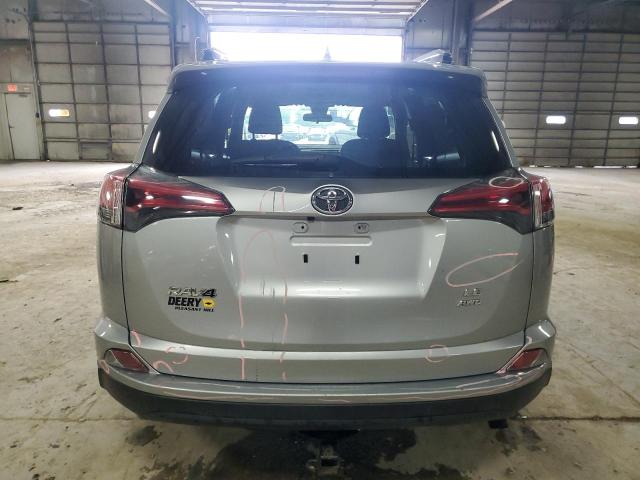 JTMBFREV8JJ237931 - 2018 TOYOTA RAV4 LE SILVER photo 6