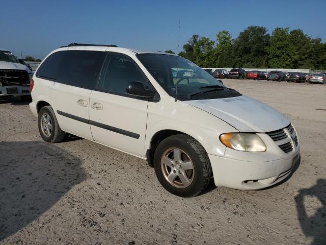 1D4GP45RX5B331403 - 2005 DODGE CARAVAN SXT WHITE photo 4