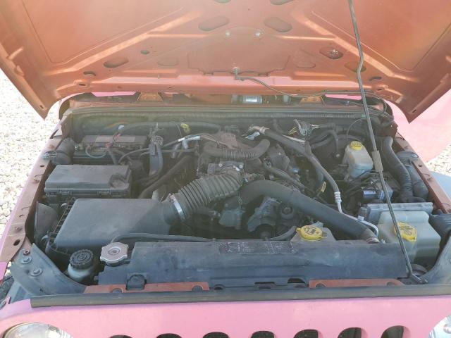 1J4BA3H15BL565344 - 2011 JEEP WRANGLER U SPORT PINK photo 12