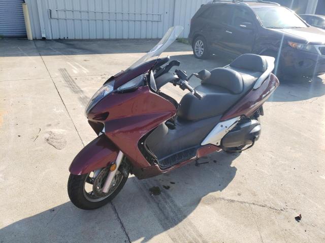 JH2PF011X9K700394 - 2009 HONDA FSC600 D MAROON photo 2