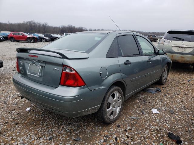 1FAFP34N45W221267 - 2005 FORD FOCUS ZX4 GREEN photo 4