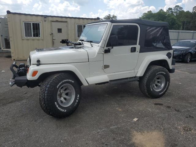 1J4FA59S2YP750666 - 2000 JEEP WRANGLER / SAHARA WHITE photo 1