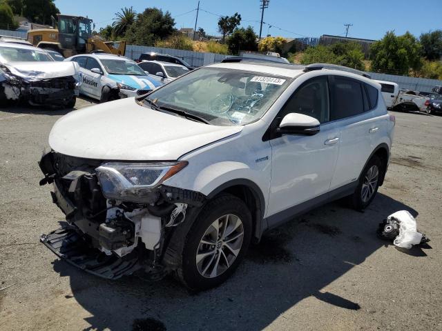 JTMRJREV5JD210780 - 2018 TOYOTA RAV4 HV LE WHITE photo 1