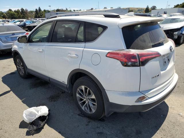 JTMRJREV5JD210780 - 2018 TOYOTA RAV4 HV LE WHITE photo 2