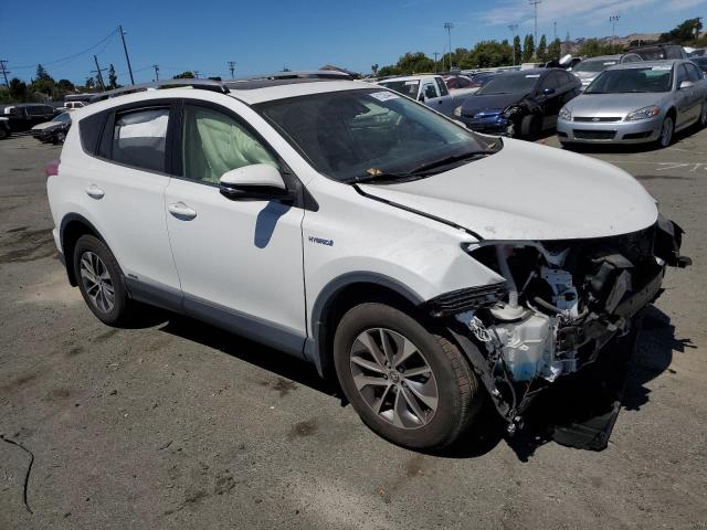 JTMRJREV5JD210780 - 2018 TOYOTA RAV4 HV LE WHITE photo 4