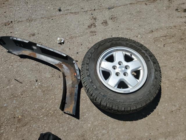 1J8GL38K45W639007 - 2005 JEEP LIBERTY RENEGADE BLACK photo 12