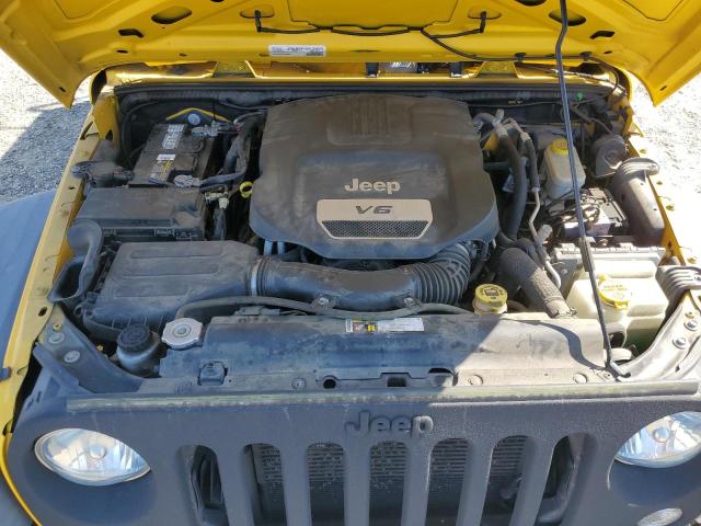 1C4HJWDG3FL585545 - 2015 JEEP WRANGLER U SPORT YELLOW photo 11