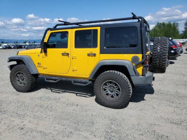 1C4HJWDG3FL585545 - 2015 JEEP WRANGLER U SPORT YELLOW photo 2
