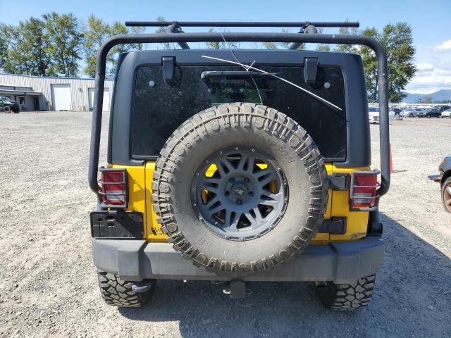 1C4HJWDG3FL585545 - 2015 JEEP WRANGLER U SPORT YELLOW photo 6