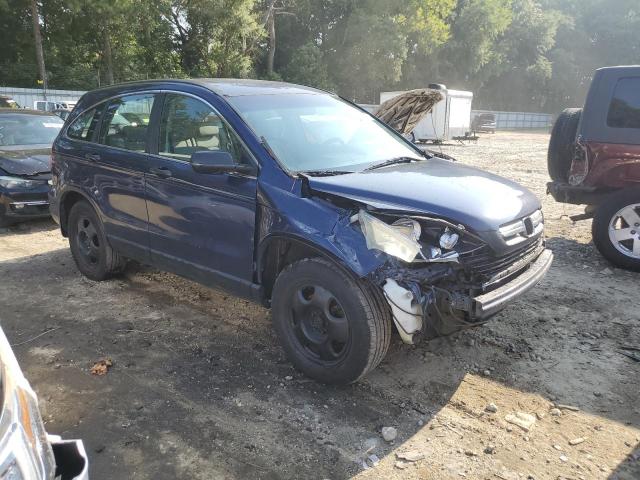 5J6RE38309L010459 - 2009 HONDA CR-V LX BLUE photo 4