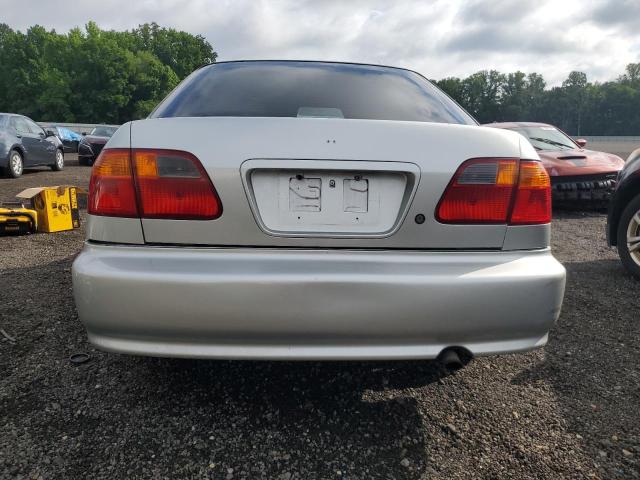 2HGEJ6610YH566142 - 2000 HONDA CIVIC BASE SILVER photo 6