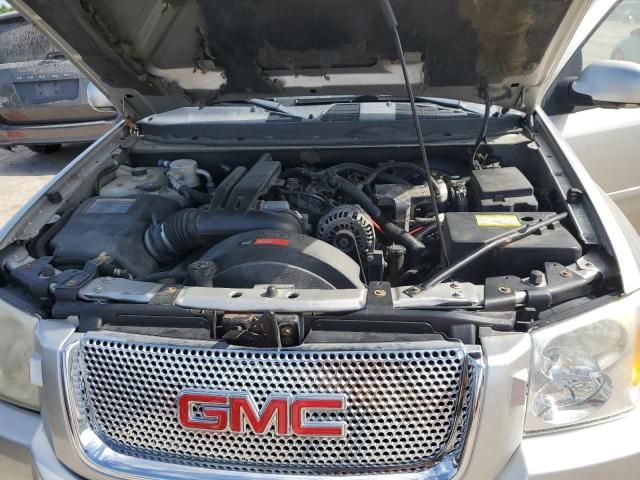 1GKET63M272148233 - 2007 GMC ENVOY DENALI SILVER photo 11