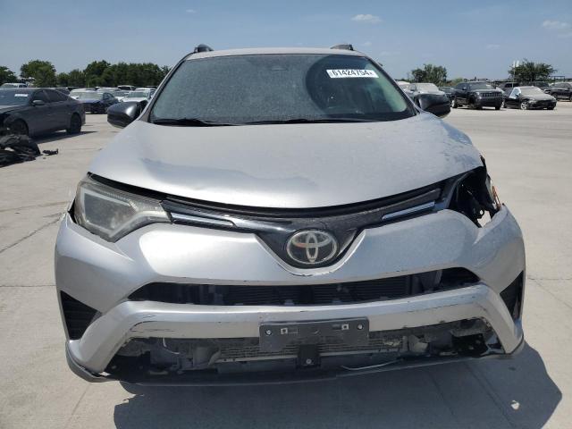 2T3ZFREV0HW373772 - 2017 TOYOTA RAV4 LE SILVER photo 5